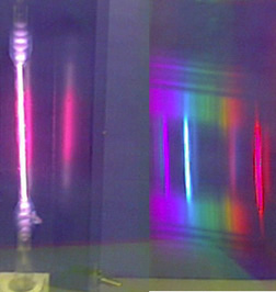 An image of a purple lamp light on one side and a series of different colors on the other side