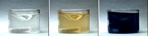 Three-photo sequence: The first photo shows clear colorless liquid with a vortex in a container. The second photo shows clear gold-colored liquid with a vortex in the container. The third photo shows a dark liquid in a container.