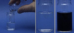 In the first photo, a hand pours clear liquid from a container into a second container with another clear liquid. In the second photo, a clear, colorless liquid in the container. In the third photo, the container holds a dark liquid.