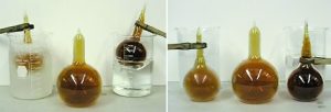 A set of three flasks of brown gas. Two are in water baths. In the second photo, a wooden clamp holds a flask with brown gas in front of a beaker with ice water, and a wooden clamp holds a beaker with dark brown gas in front of a beaker with clear liquid. A larger flask with brown gas appears between two flasks. The relative colors of the flasks have changed.