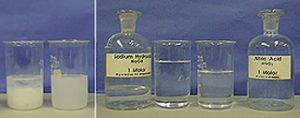The first photo shows a white precipitate appears in the bottom of the beaker on the left. The beaker on the right contains cloudy liquid. The second photo shows a stoppered bottle with an identifying label and clear liquid, a beaker with clear liquid, a beaker that contains less clear liquid, and a stoppered bottle with an identifying label.