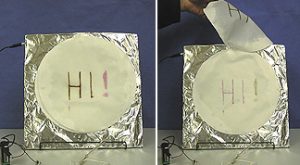 A filter wetted with with chemicals and mounted on foil changes color when DC current is applied.